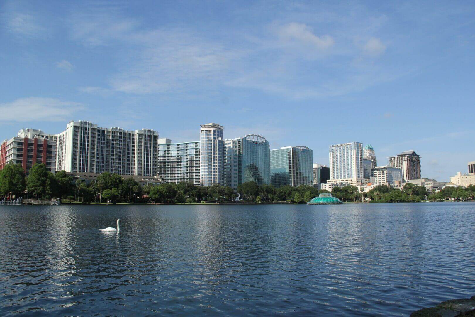 A body of water with buildings in the background.