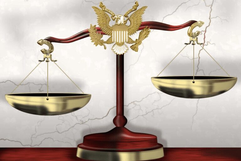 Scales of justice with eagle emblem. Scales of justice with eagle emblem.